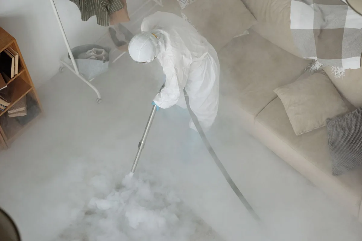 Biohazard cleanup technician in protective equipment, Gun Club Estates, FL